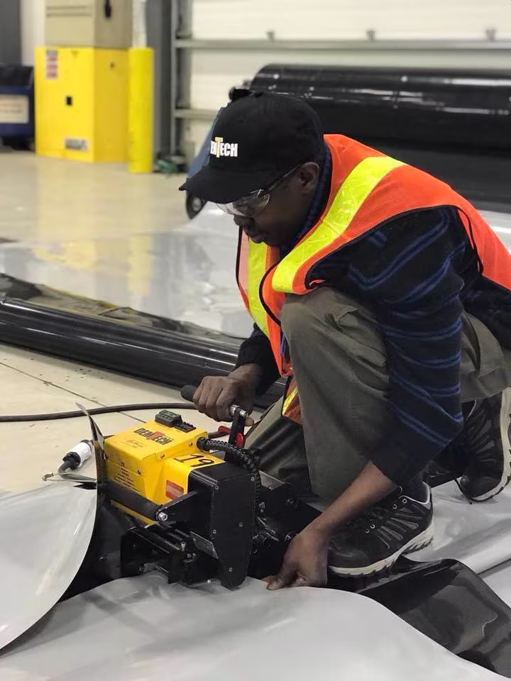 Worker using Demtech equipment