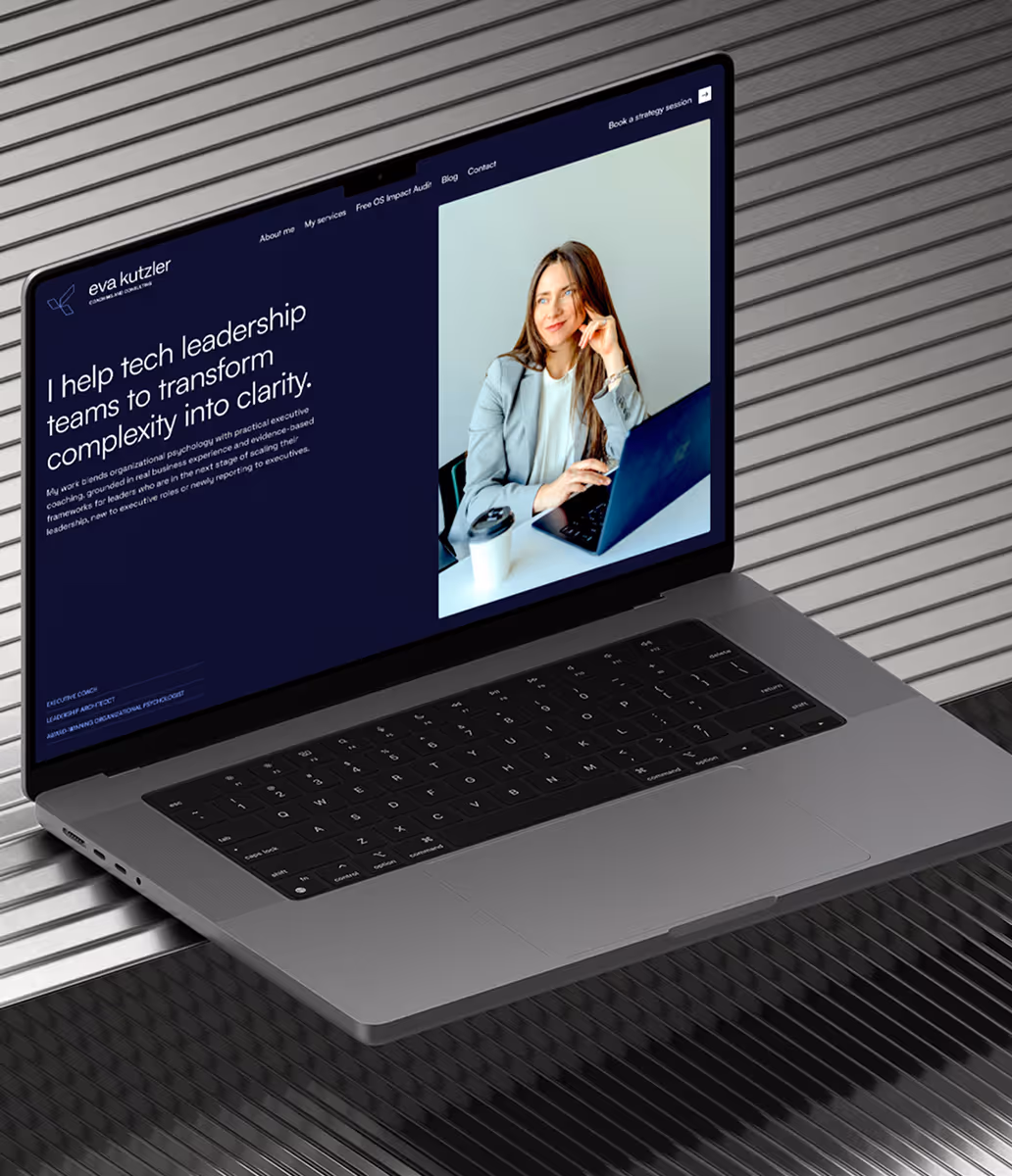 Laptop mockup of the Eva Kutzler website homepage.