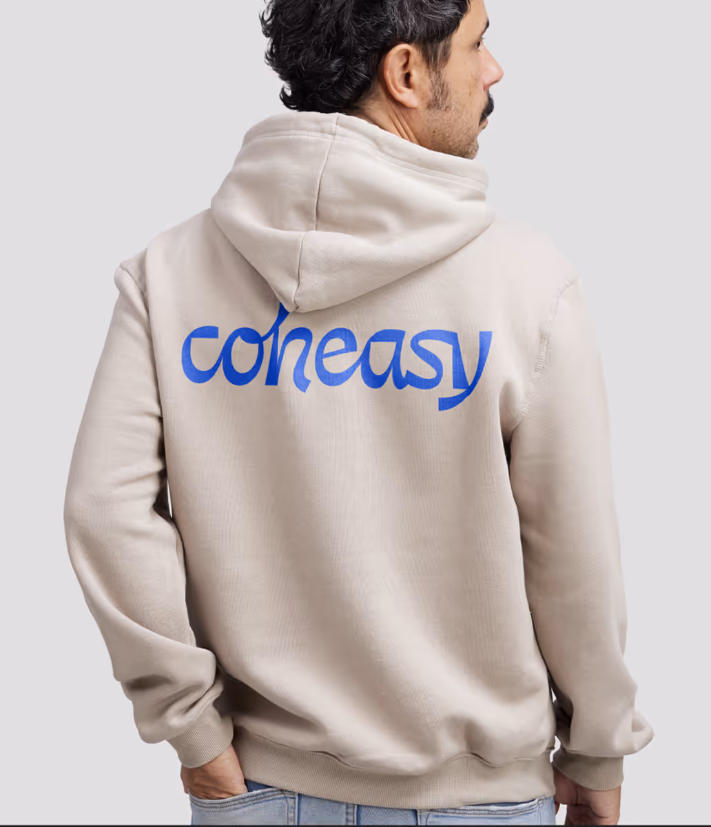 Coheasy logo mockup on a sweater worn by a man.