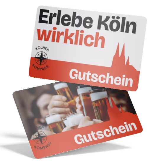 Zwei Kölner Kompass Gutscheinkarten mit der Aufschrift 'Erlebe Köln wirklich