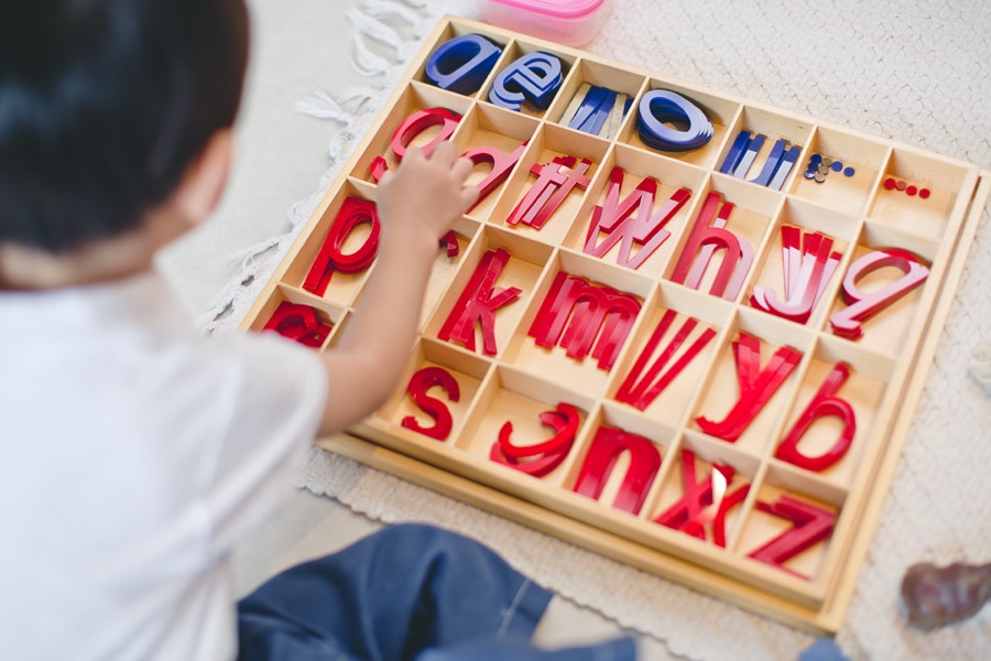 A child reading aloud in Josiah ACE Phonics