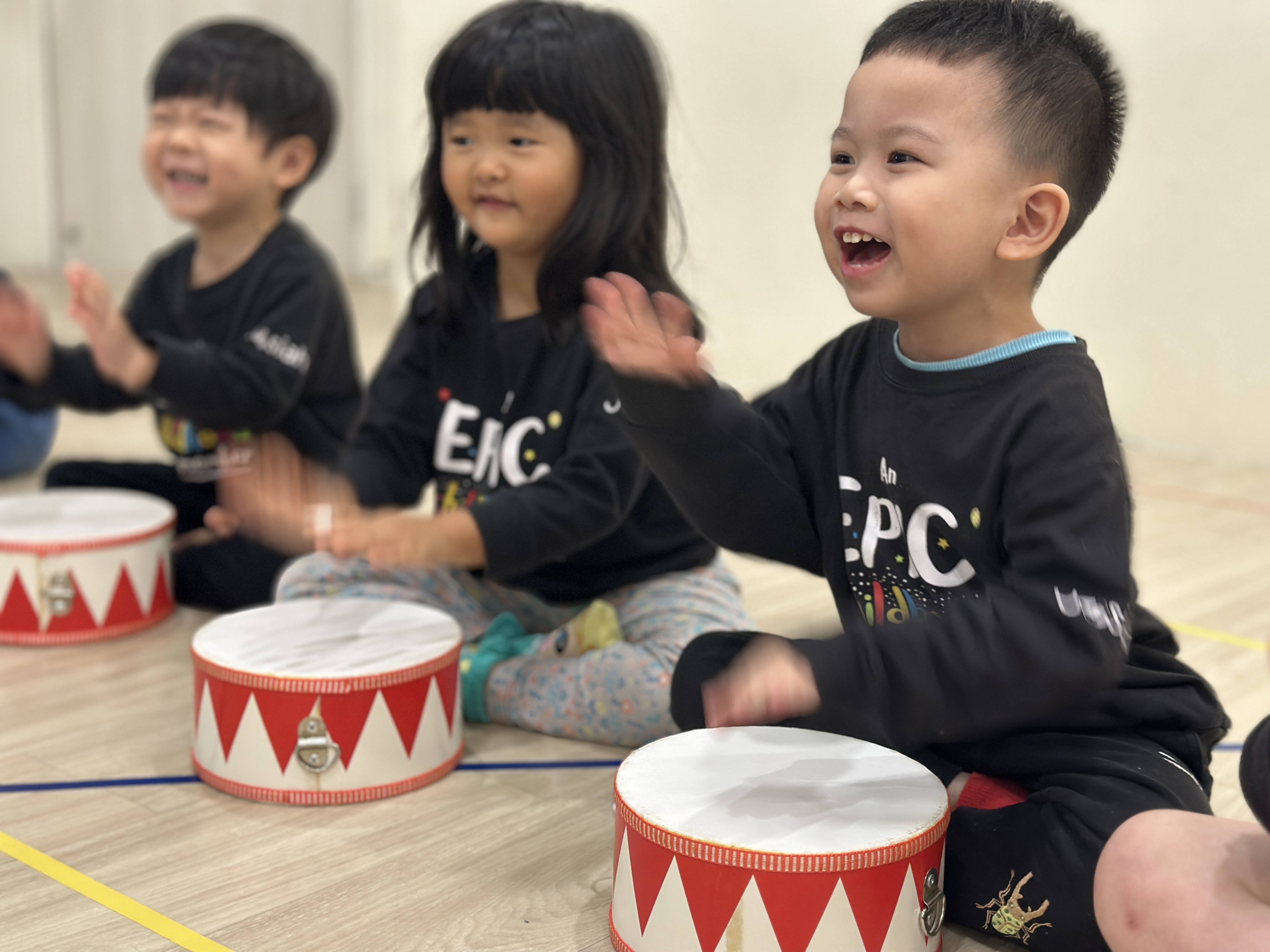 Children singing and moving in Josiah Music Lab