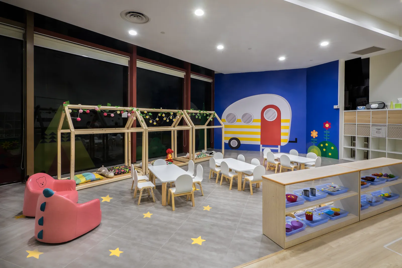 The toddler room at Suntec City, with its camper-van wall.