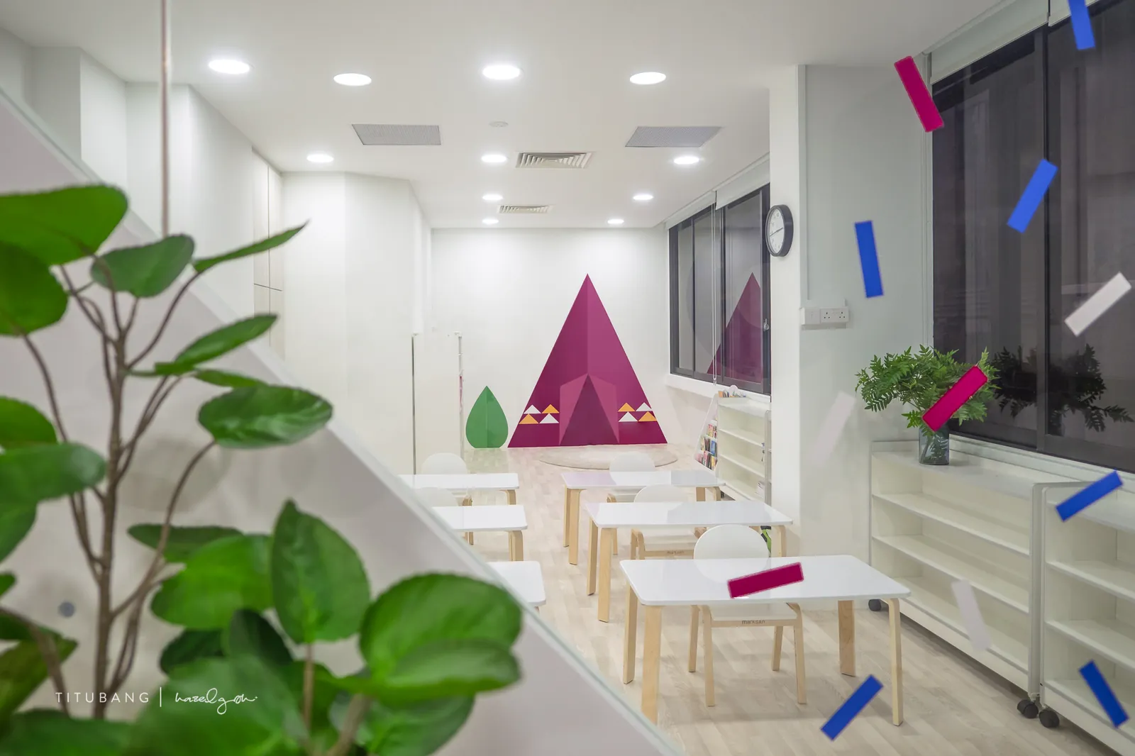 A quiet classroom at Raffles Place, seen past the planting.