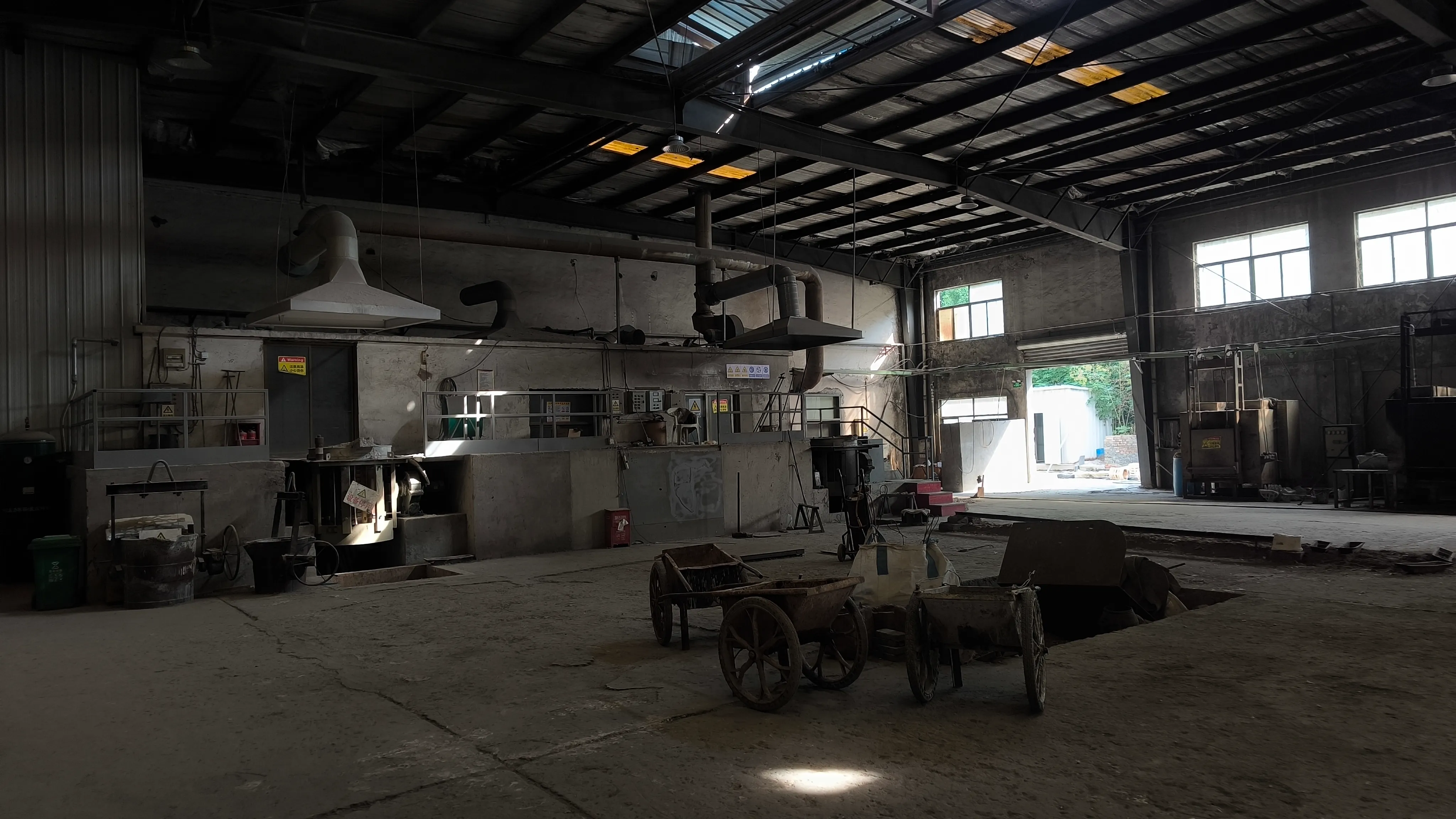 Workshop area used for final assembly, inspection, packing, and delivery preparation.