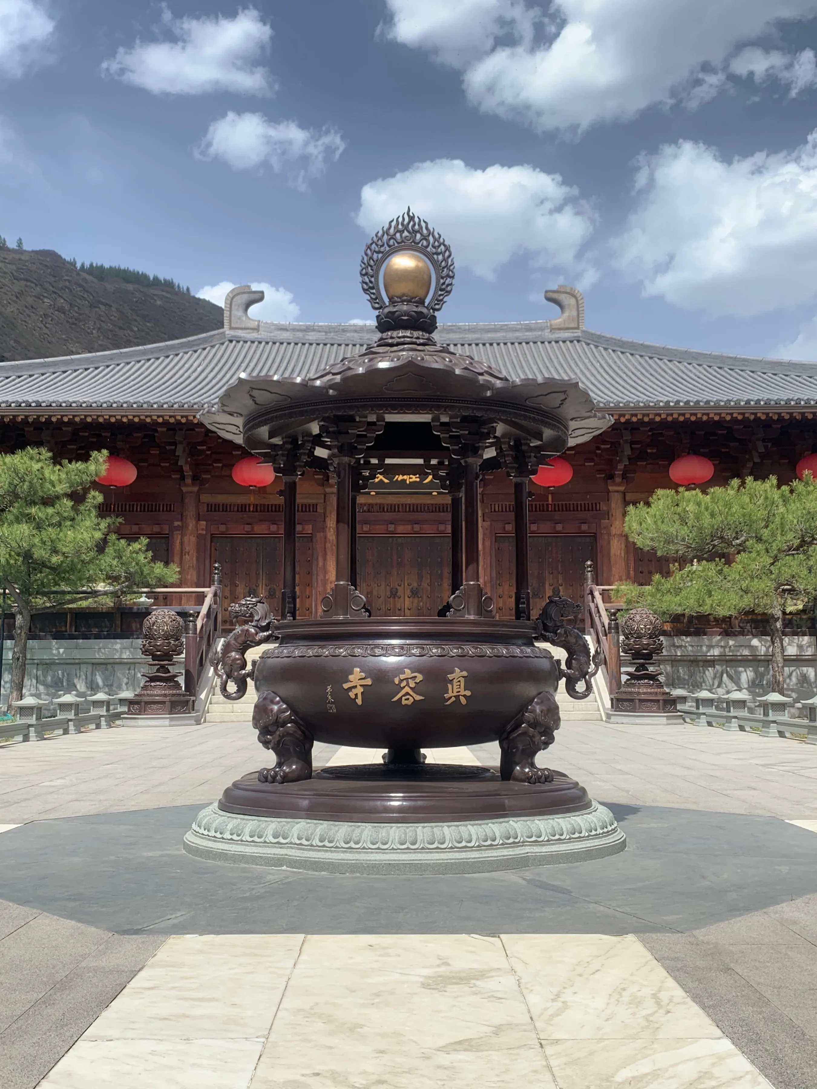 Large pavilion-style bronze censer installed in the courtyard of Zhenrong Temple at Mount Wutai