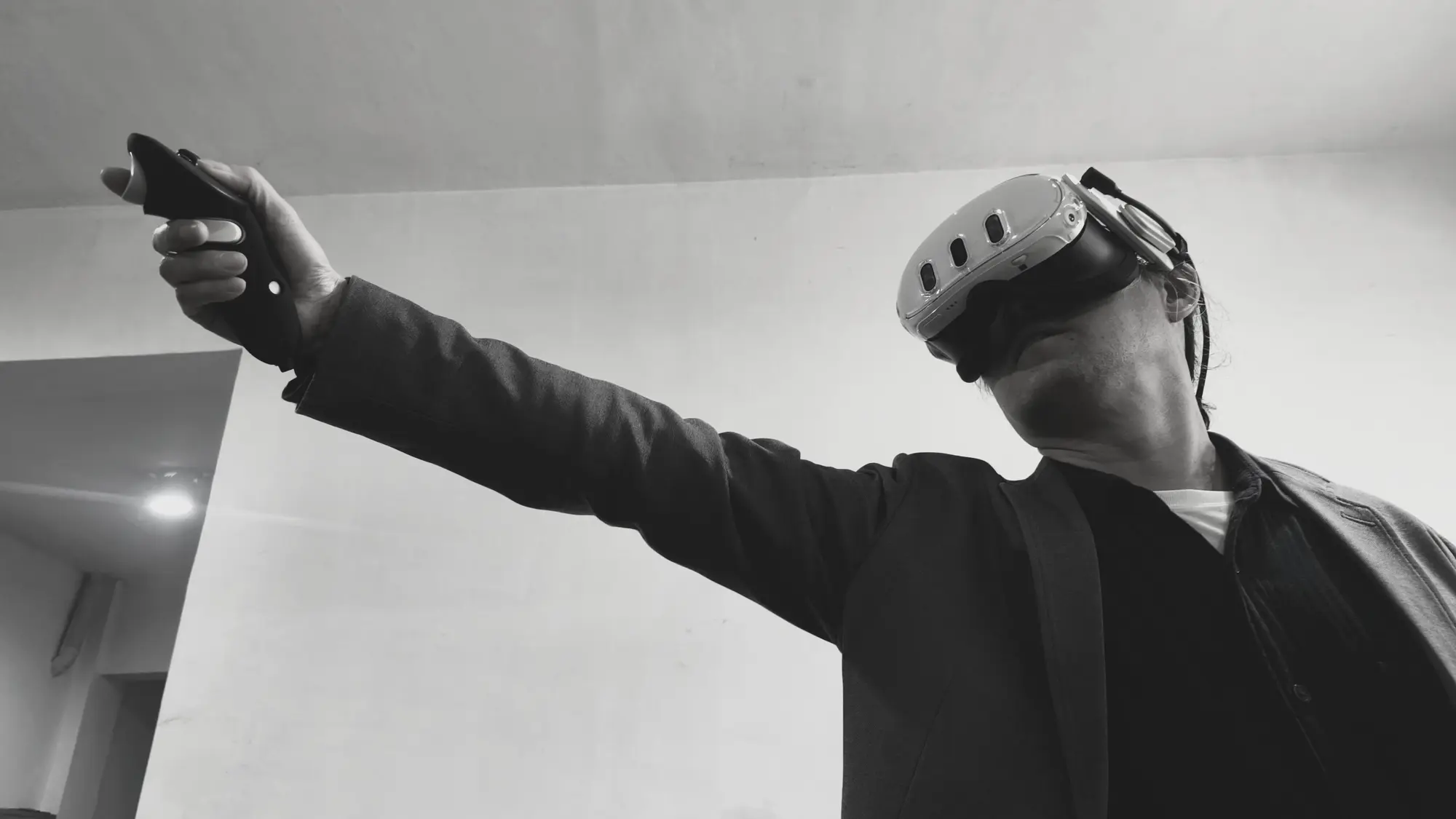 A designer reviewing a project model through an immersive VR headset.