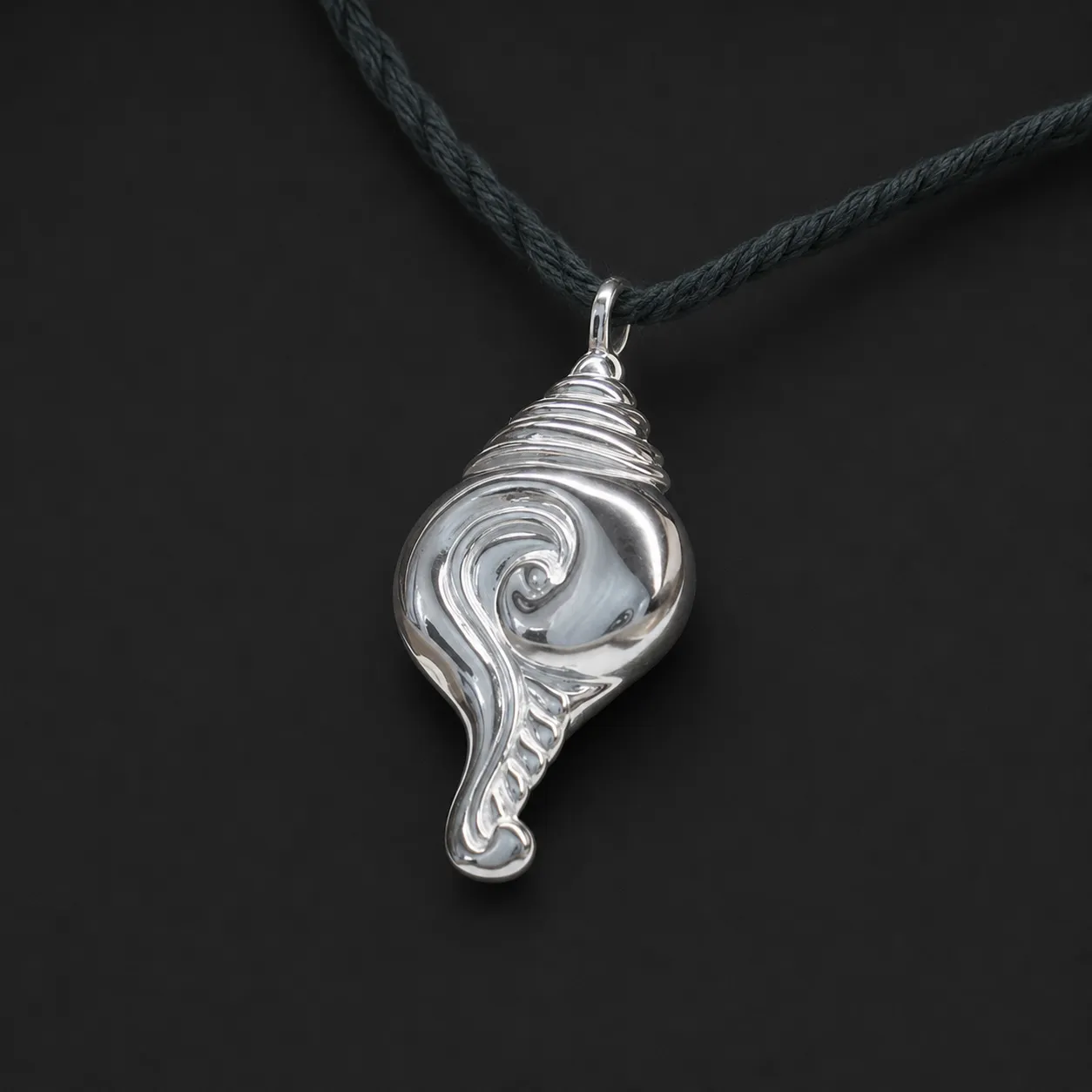 Conch Pendant — The spiral front of the pendant