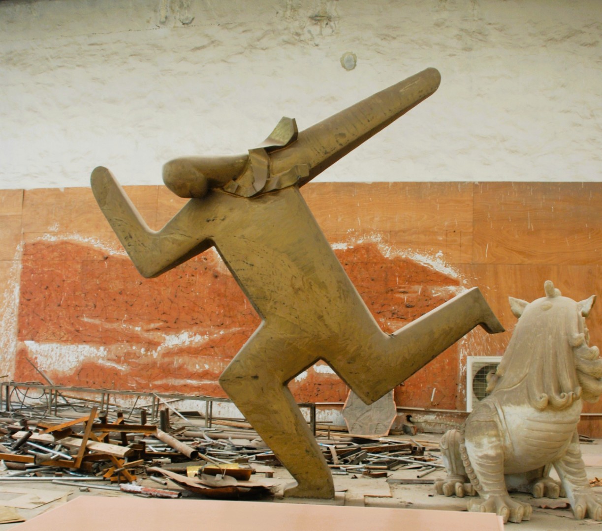 A large stylised figure under development in the workshop.