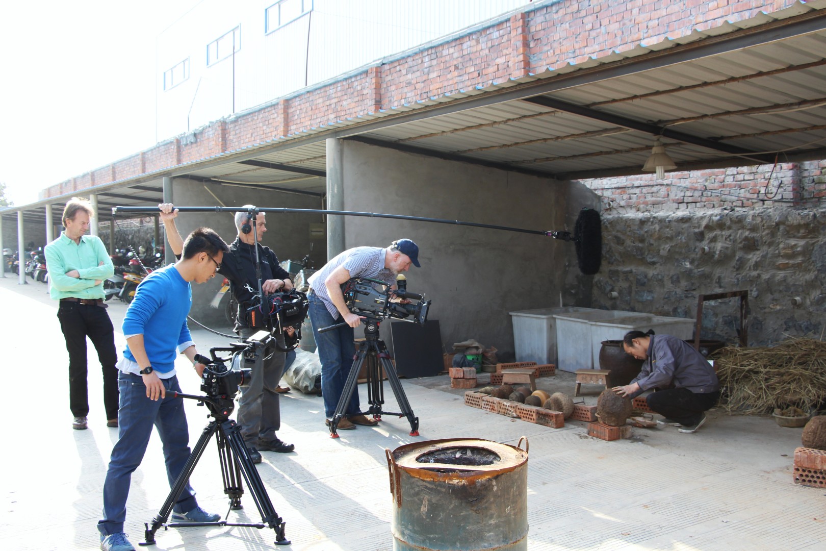 The camera and sound crew filming a workshop demonstration.