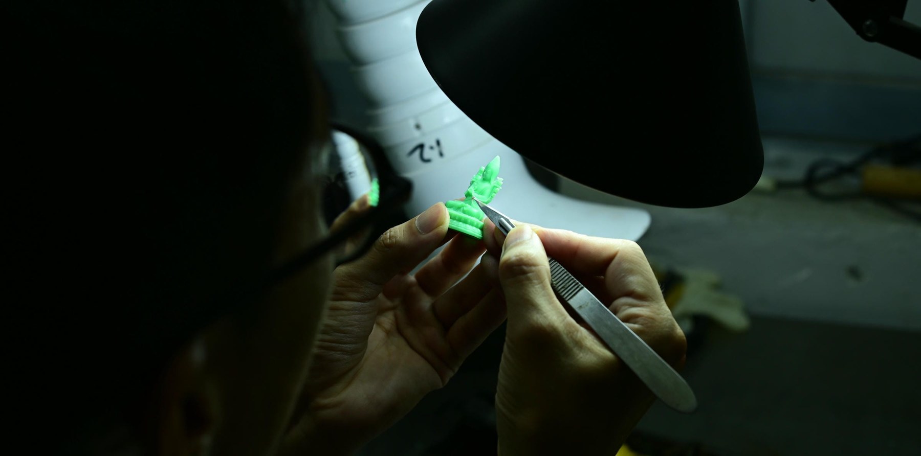Careful work on a wax pattern.