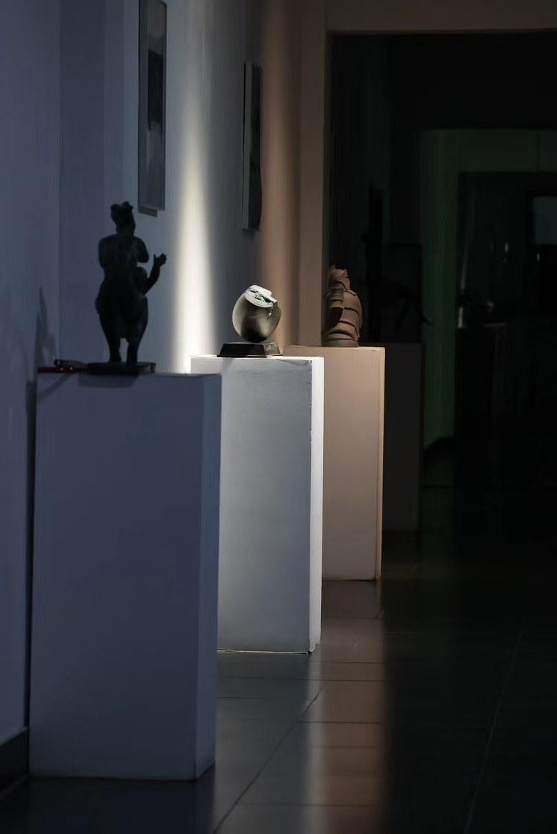 A sculpture presented at an intimate scale.