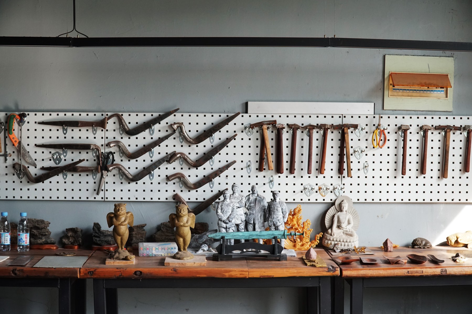 The workbench — tools and accumulated knowledge.