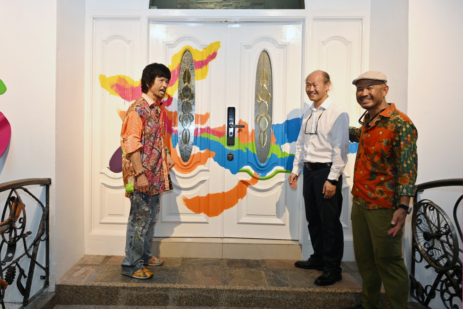 Guests together inside the gallery.