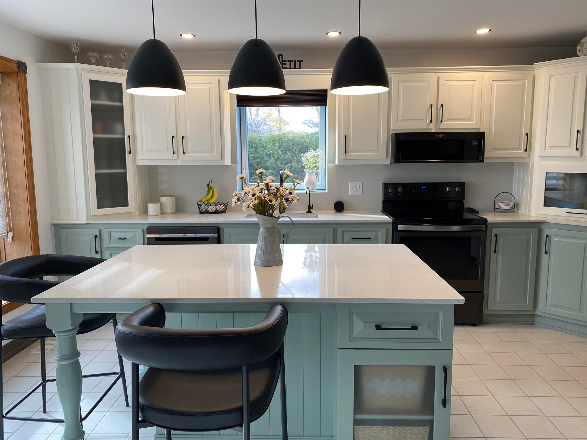 Refaced kitchen cabinets with new doors by FCD Kitchen & Bath