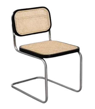 Black metal cantilever chair with woven cane seat and backrest.