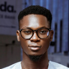 Headshot of man with glasses