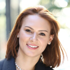 Headshot of woman with red hair