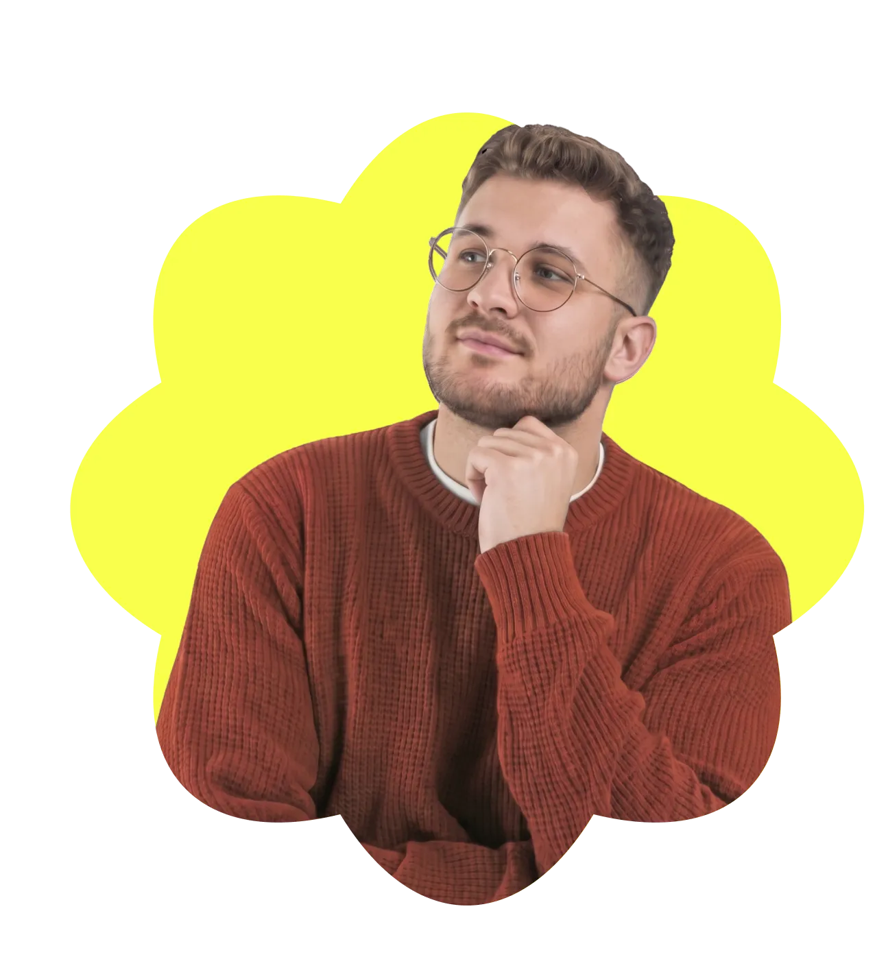 Young bearded man with glasses in a red sweater looking thoughtfully to the side against a yellow background.