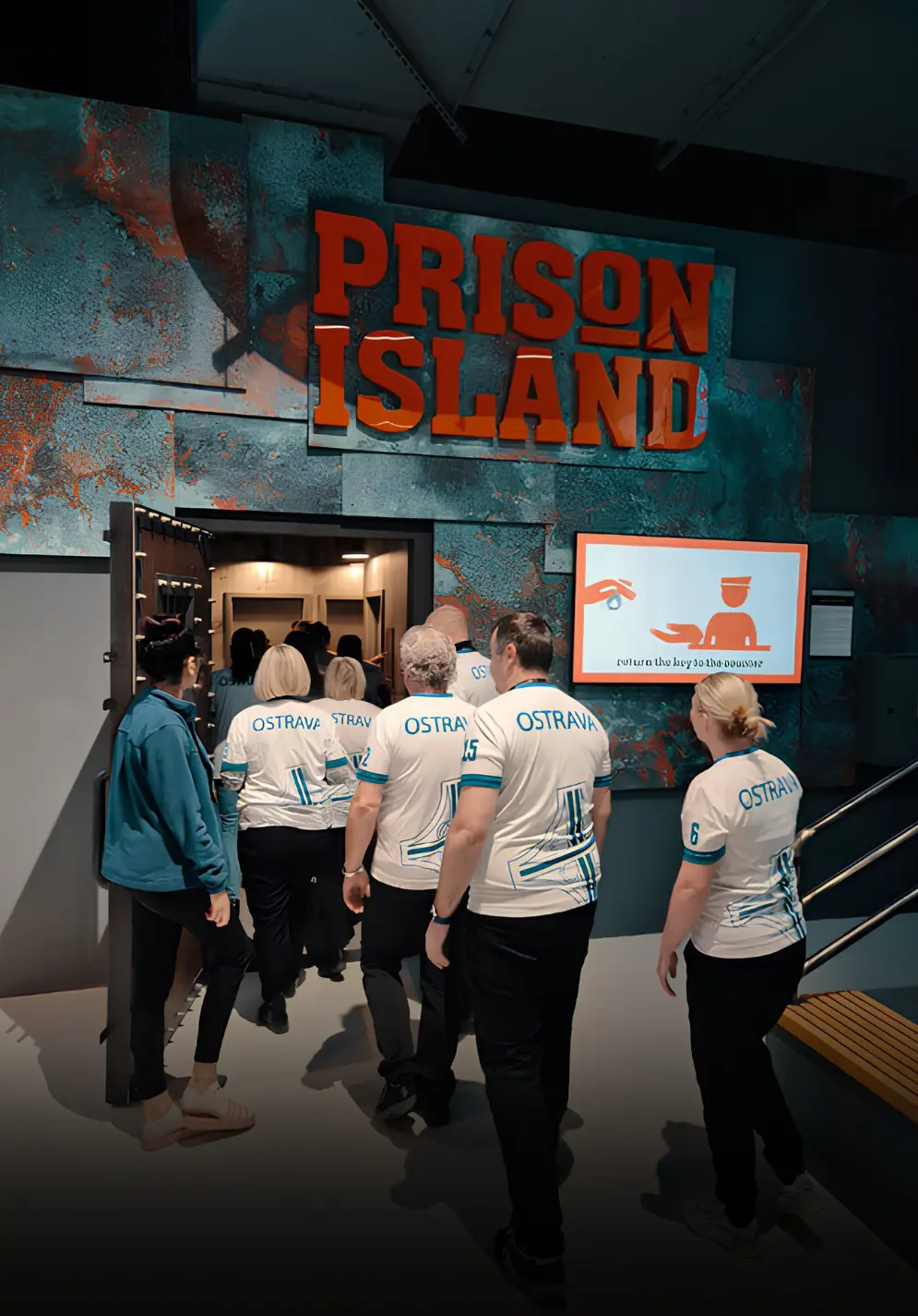 Prison Island Ostrava visitors during a team activity inside the venue