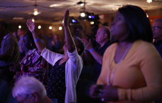 Ladies are worshiping at  at Faith Christian Fellowship