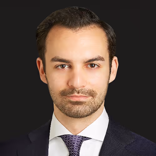 Headshot of Justin Mankita, CEO of Perqia