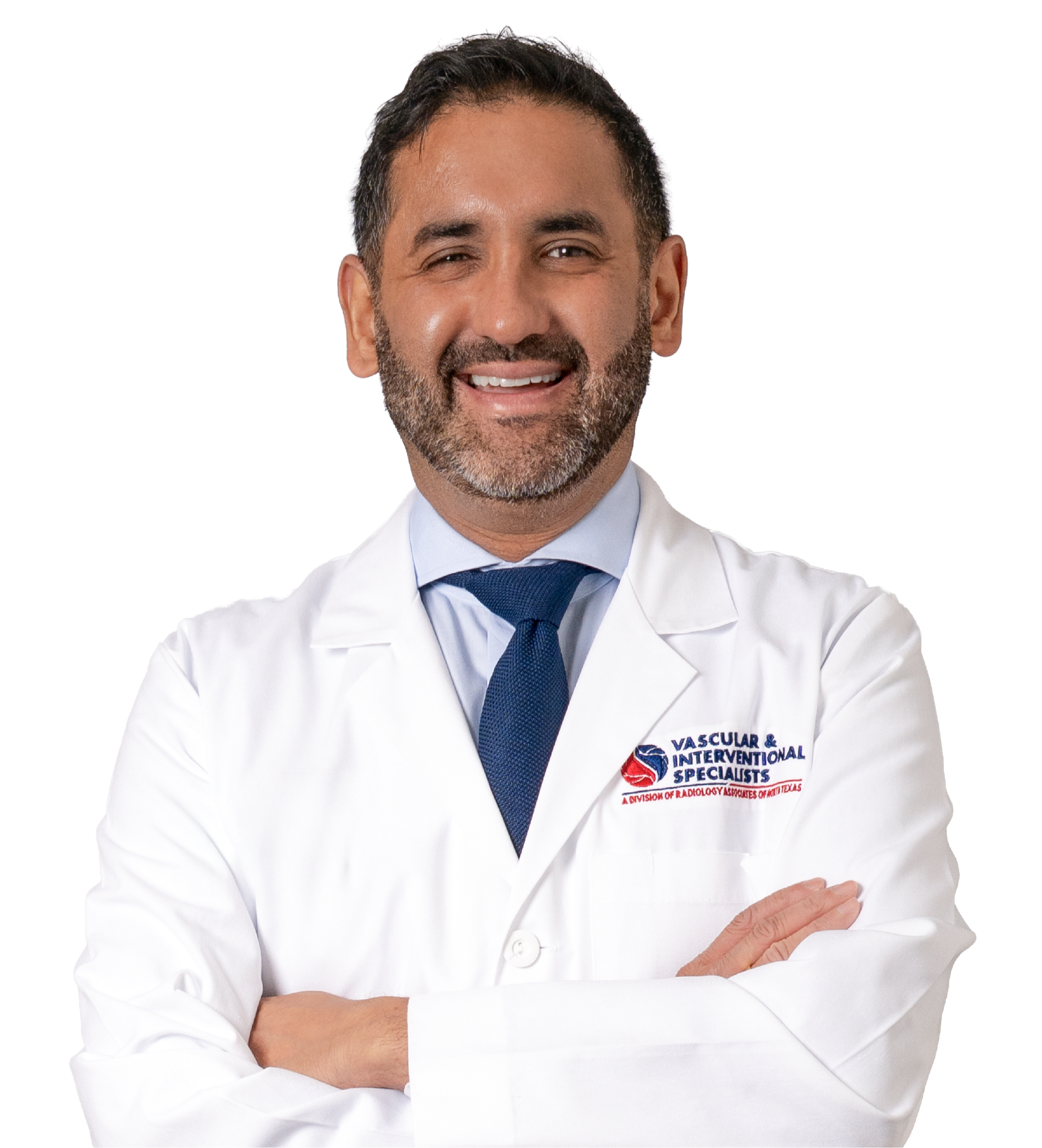 Smiling male doctor with beard in white coat and blue tie with arms crossed.