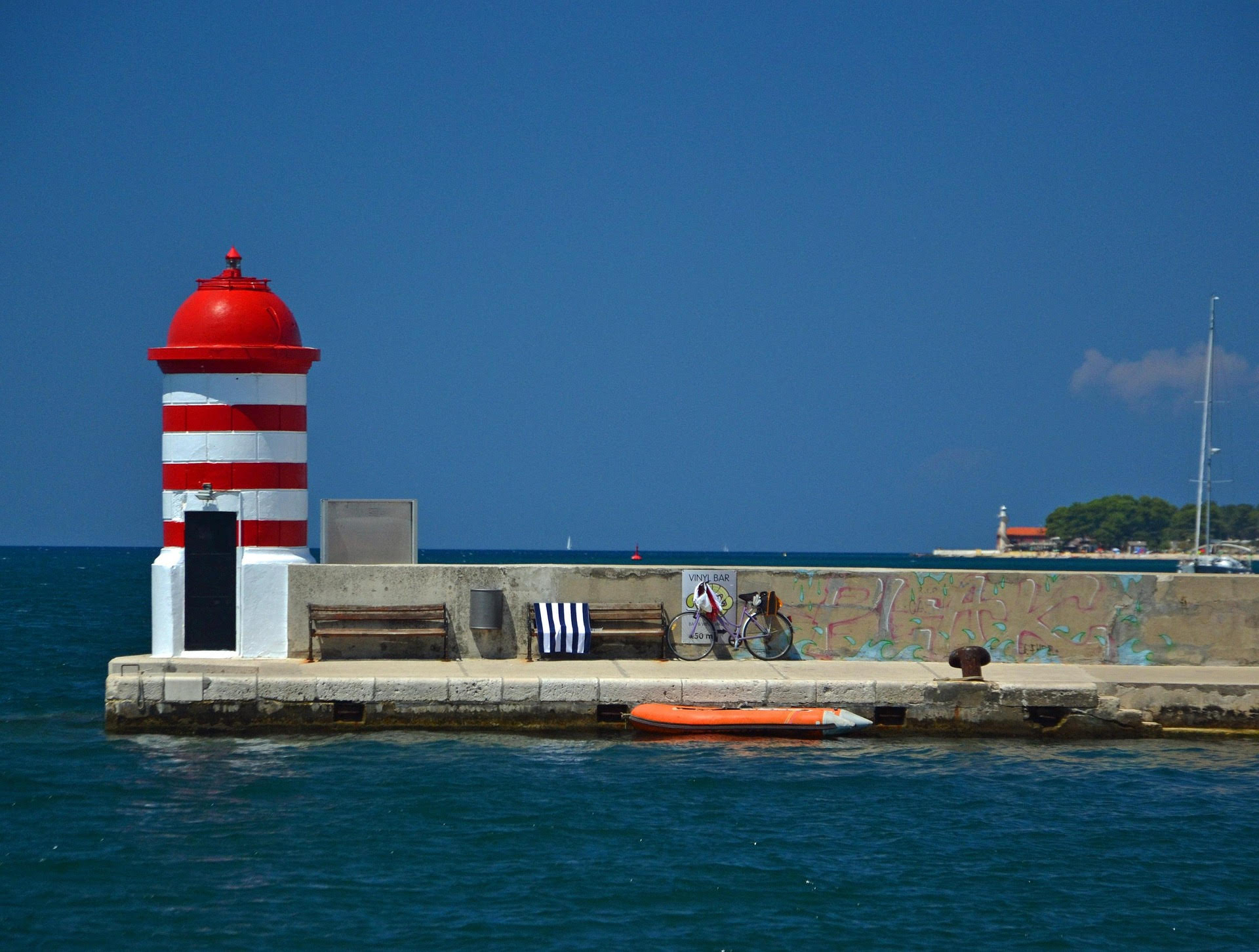zadar pier with lighthouse