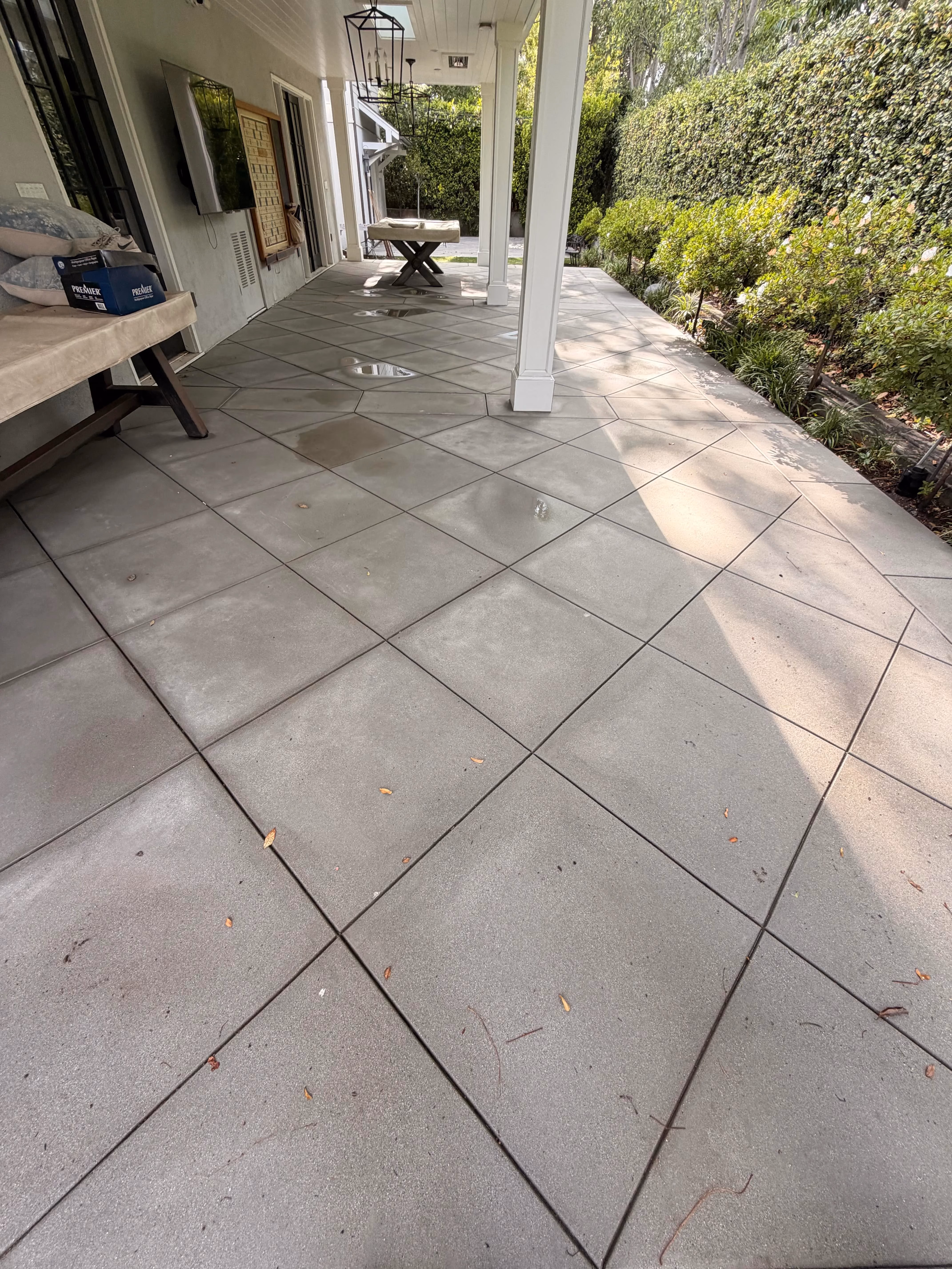 Clean covered patio pavers after pressure washing by Rexterior in Pasadena