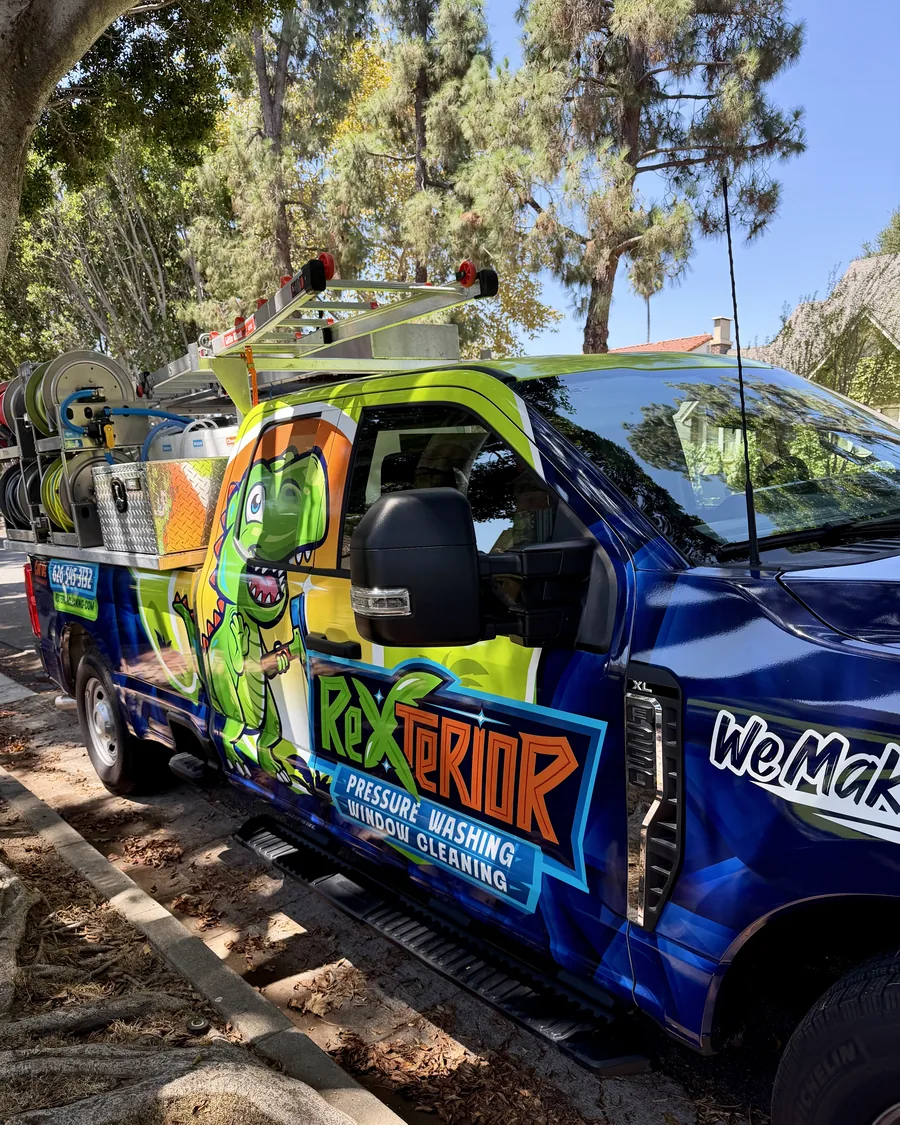 Rexterior service truck with mounted pressure washing and window cleaning equipment