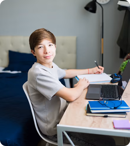 Student writing at a desk during an Independent Educational Evaluation in the Bay Area