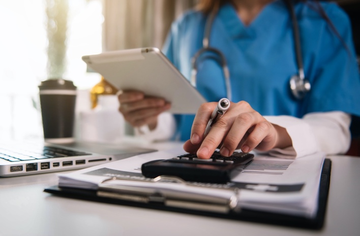 Doctor working on medical billing