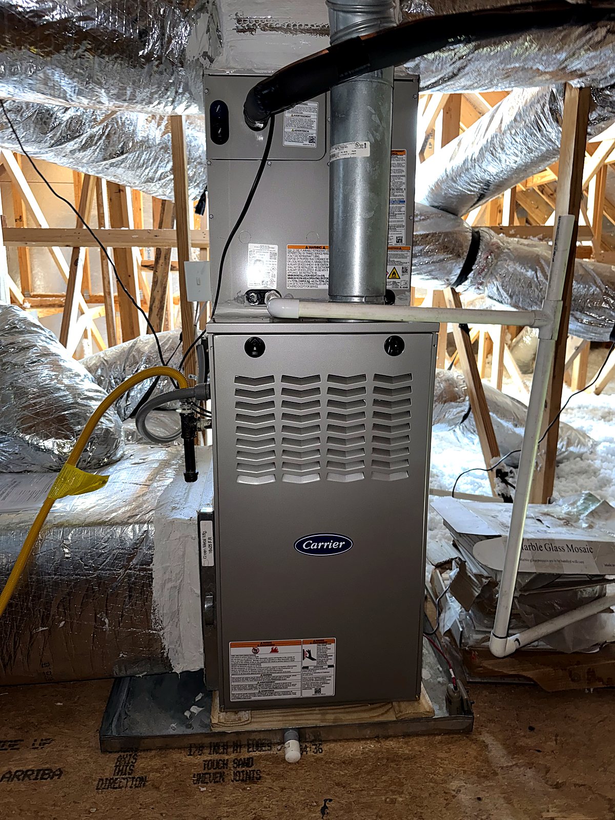 Carrier furnace installed in an attic during new construction