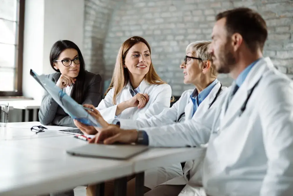 Doctors having a discussion at a table