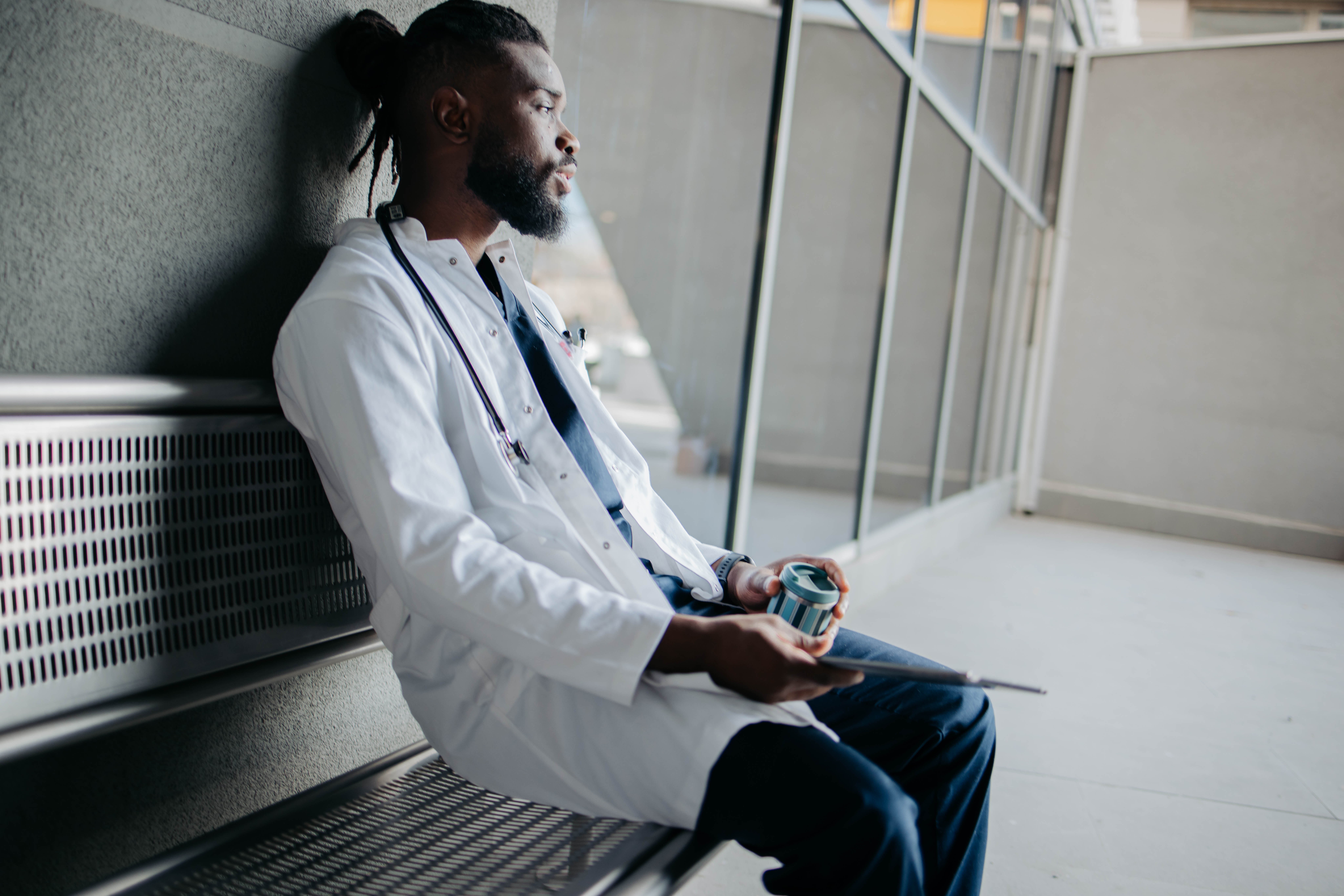 Physician experiencing administrative burden in a clinical environment