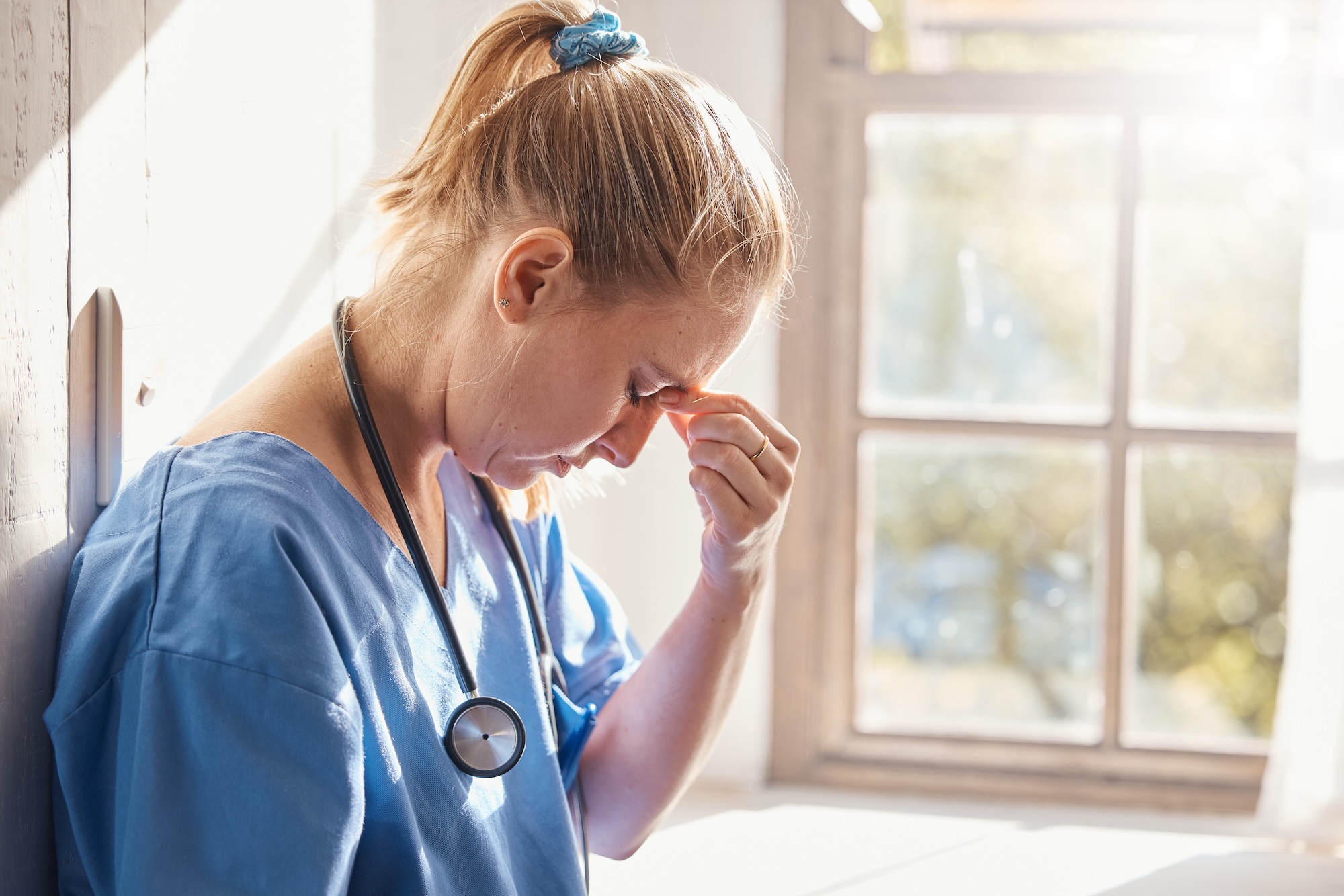 Nurse managing clinical workload in a hospital setting
