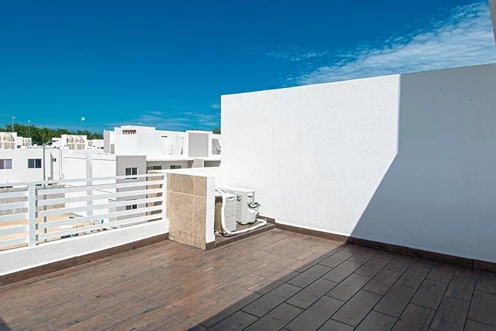 Private rooftop terrace at Casa Ceiba with panoramic views over the gated community