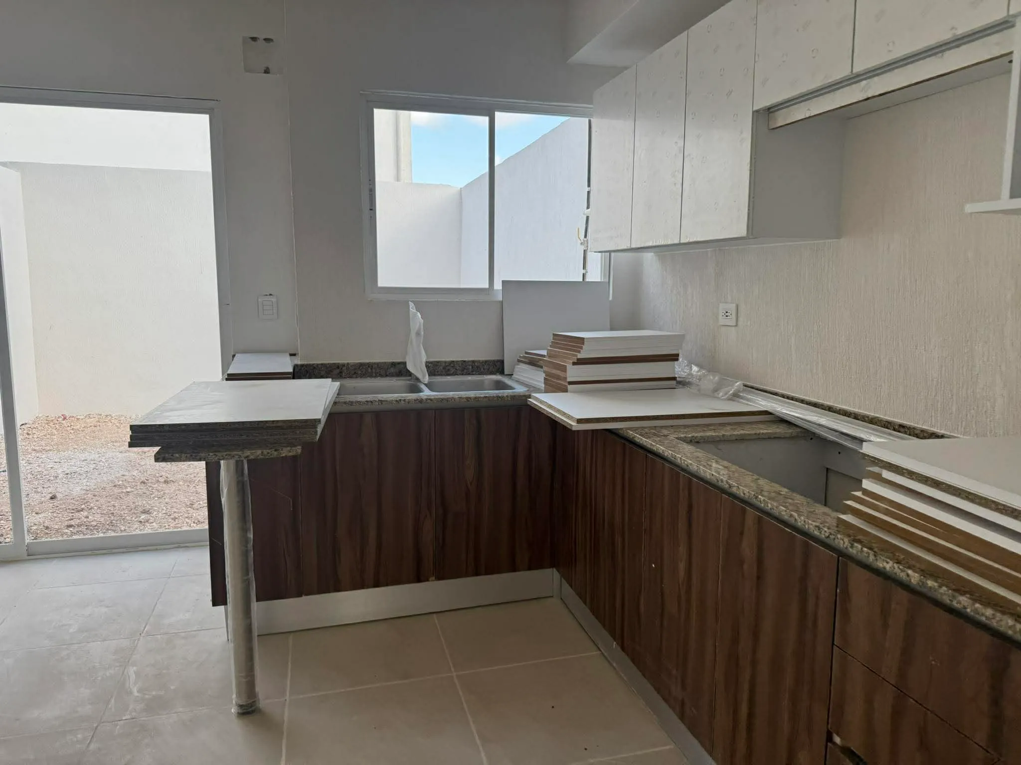 Kitchen at Casa Ceiba with a full-size fridge and appliances for a whole crew