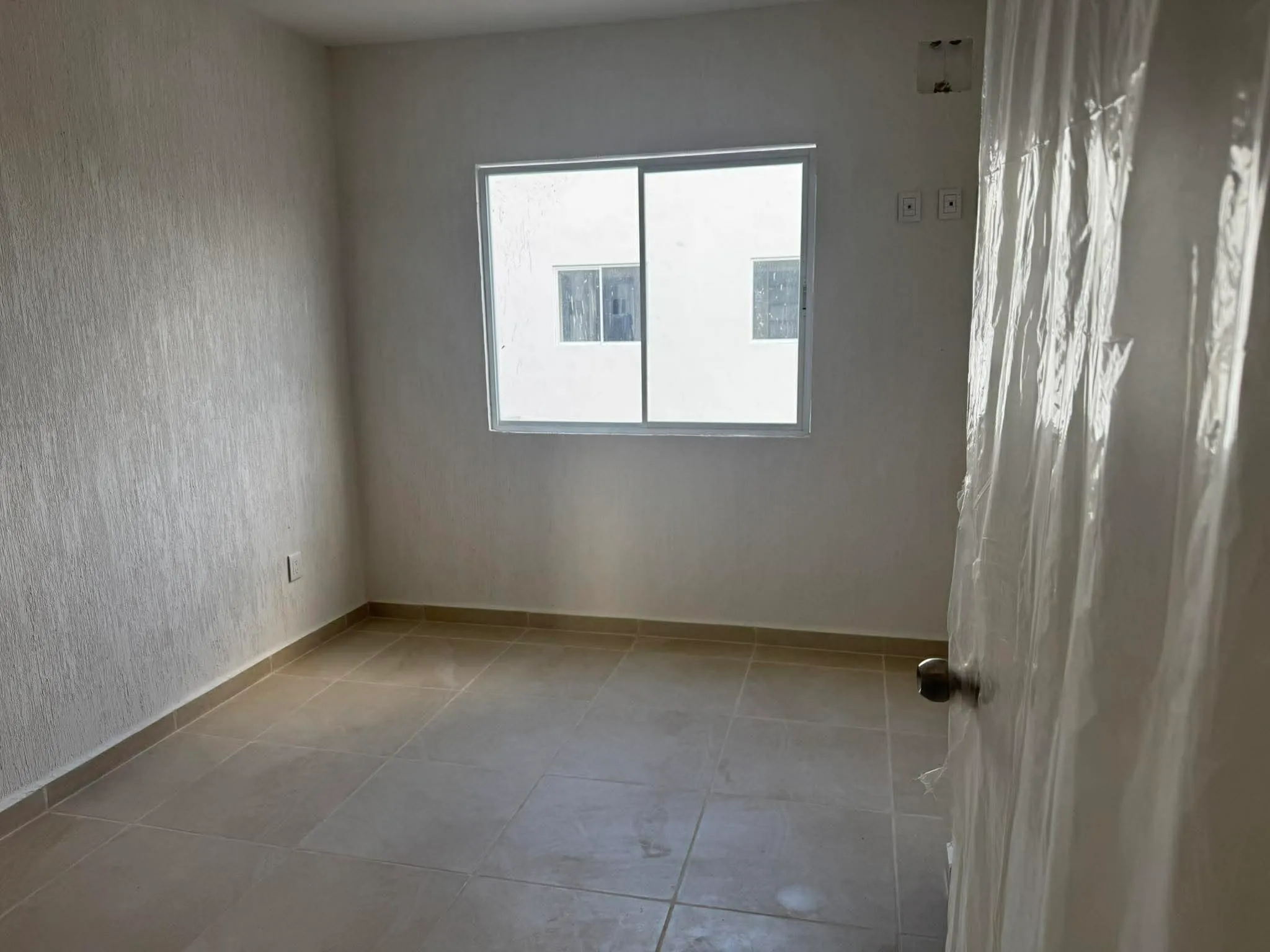 Master bedroom at Casa Ceiba, set up for blackout daytime rest between flights