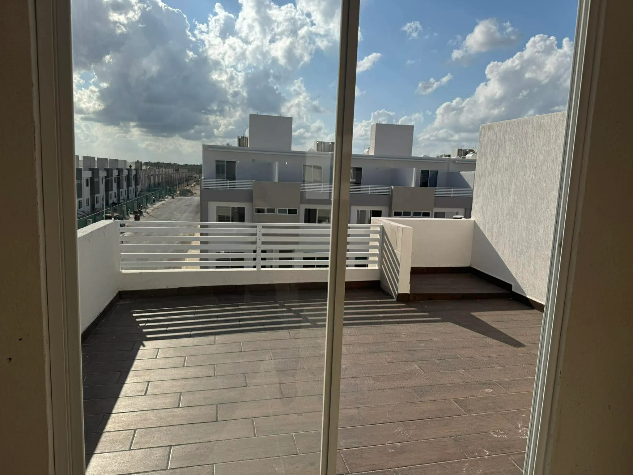 Rooftop terrace at Casa Ceiba, Cancún, at sunset