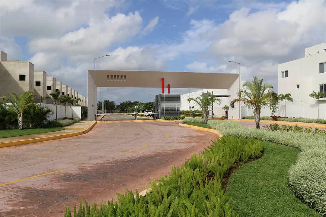 Guarded entrance gate of the Jardines del Sur 6 community in Cancún