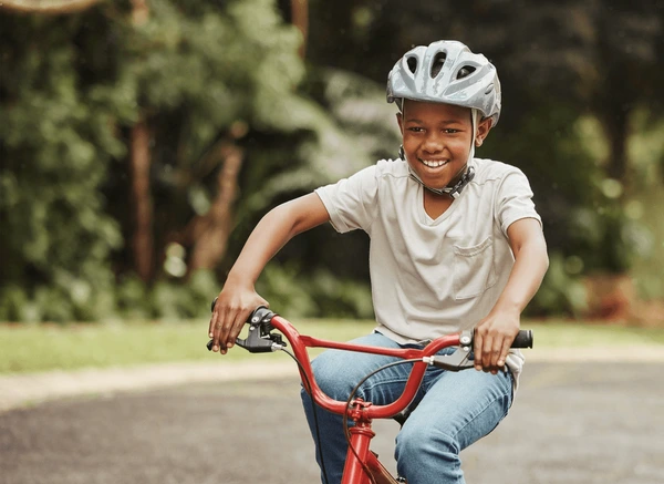 happy-black-child-riding-on-600nw-2505858345