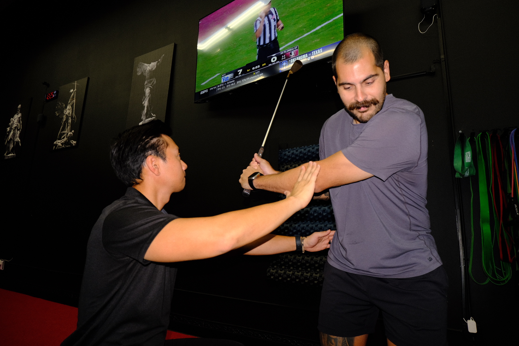 Patient receiving manual therapy on their shoulder at a sports physical therapy clinic in Sunrise, FL