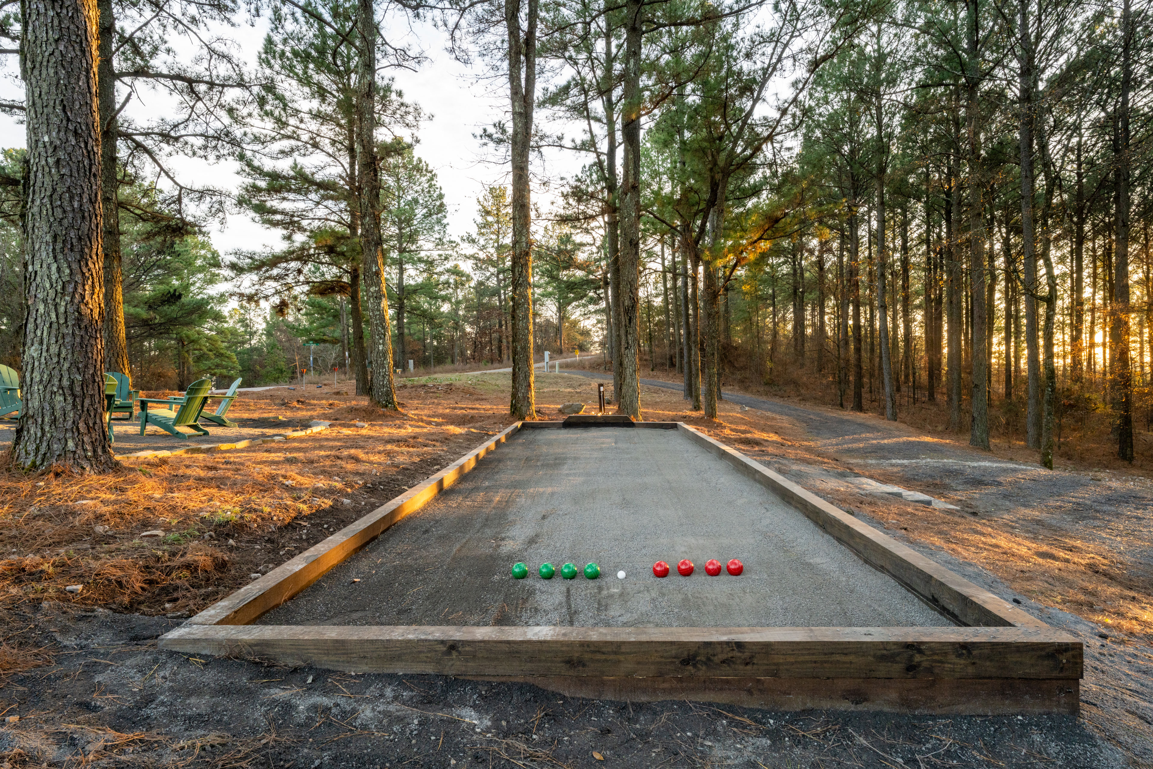 Enjoy friendly competition on our bocce ball court. It's a perfect game for all ages and skill levels. You can also bring the cornhole boards up from the porch and play them here as well. It's lit by string lights so you can play after dark.
