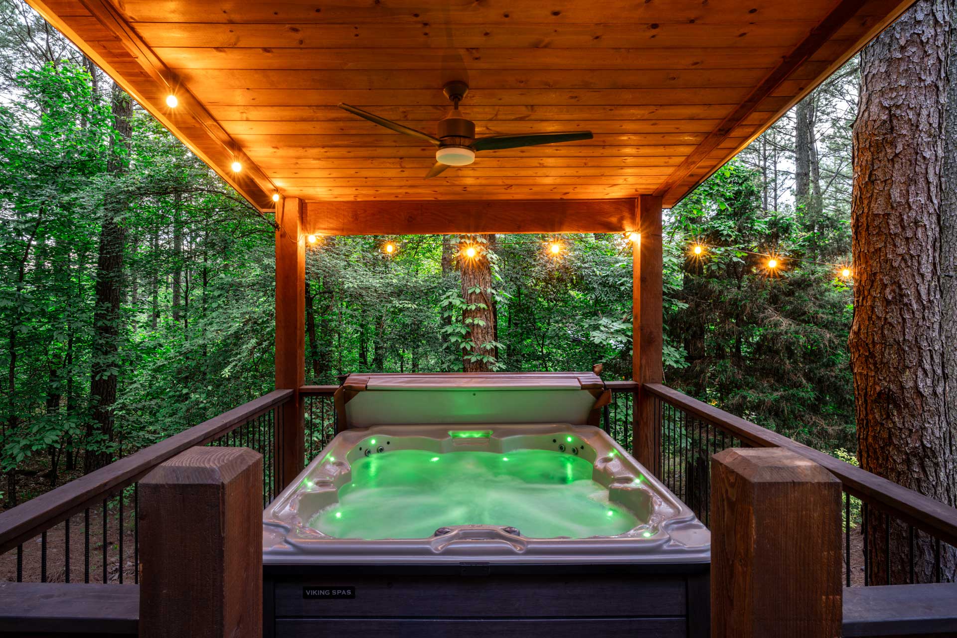 A bubbling hot tub on the deck provides a relaxing soak with forest views, making it a highlight for guests seeking rest and relaxation. The top opens and closes easily with the lift assist. We also provide extra towels for everyone to use.