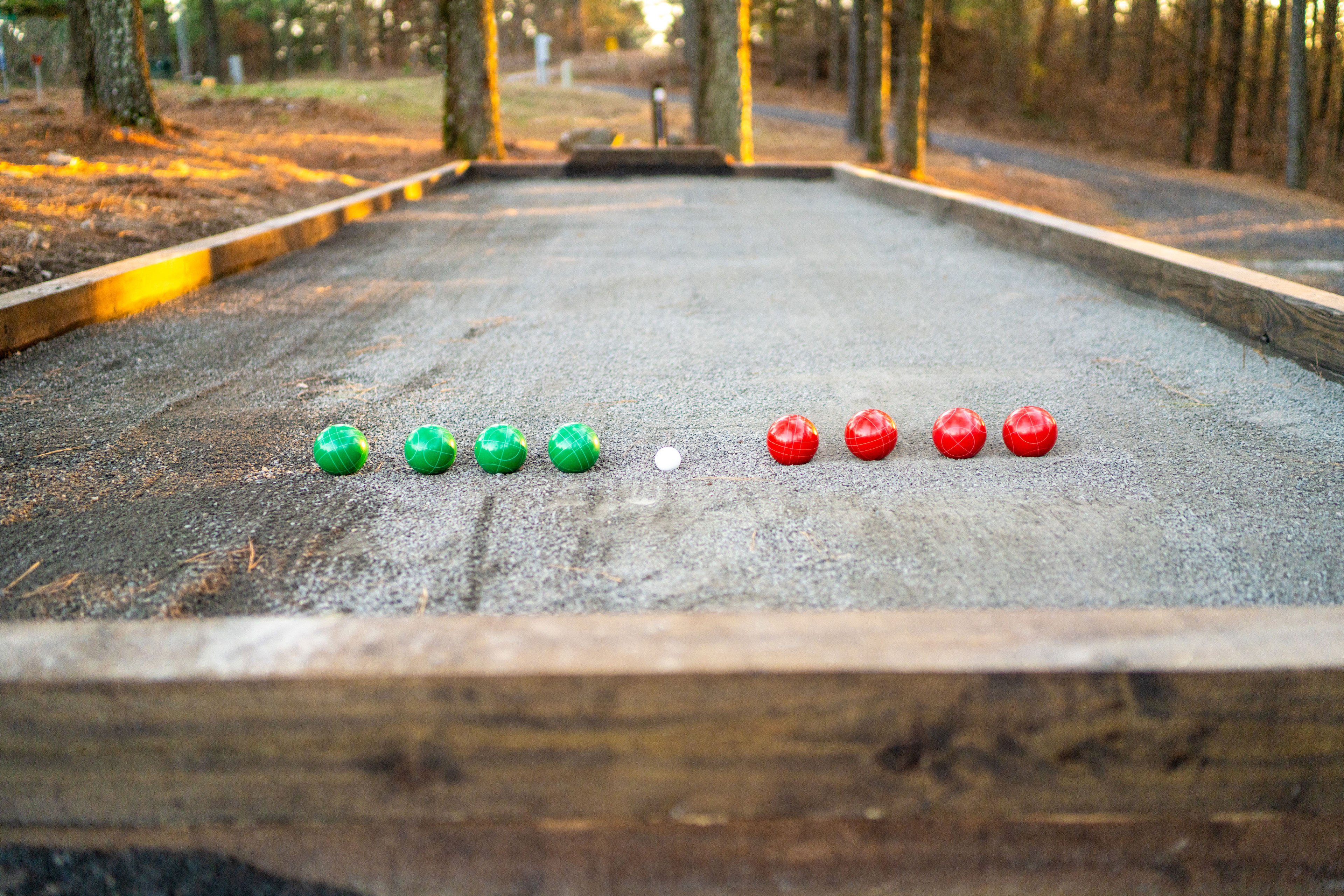 Enjoy friendly competition on our bocce ball court. It's a perfect game for all ages and skill levels. You can also bring the cornhole boards up from the porch and play them here. It's lit by string lights so you can play after dark.