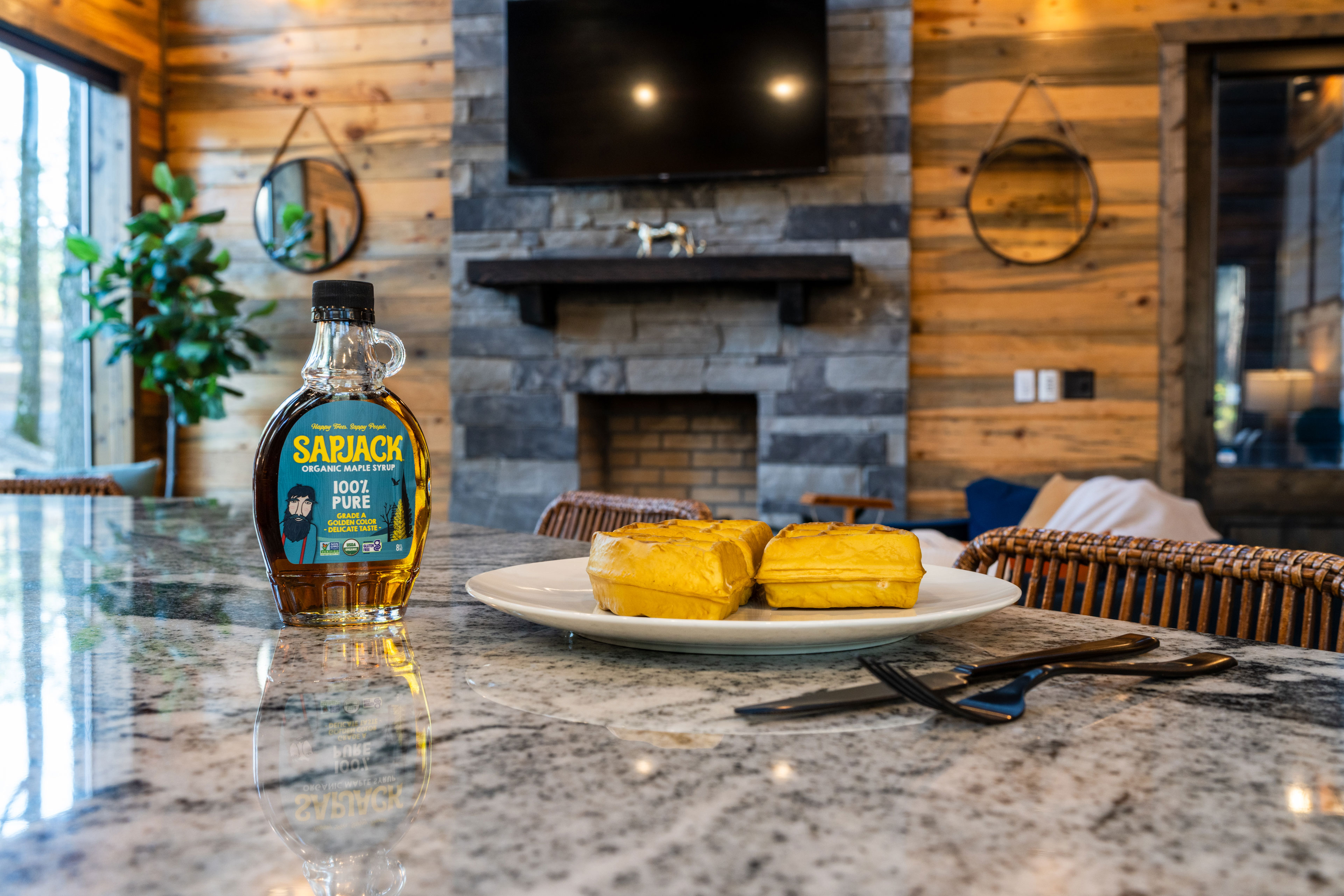 Enjoy casual meals from the island that seats up to four in wicker bar stools.