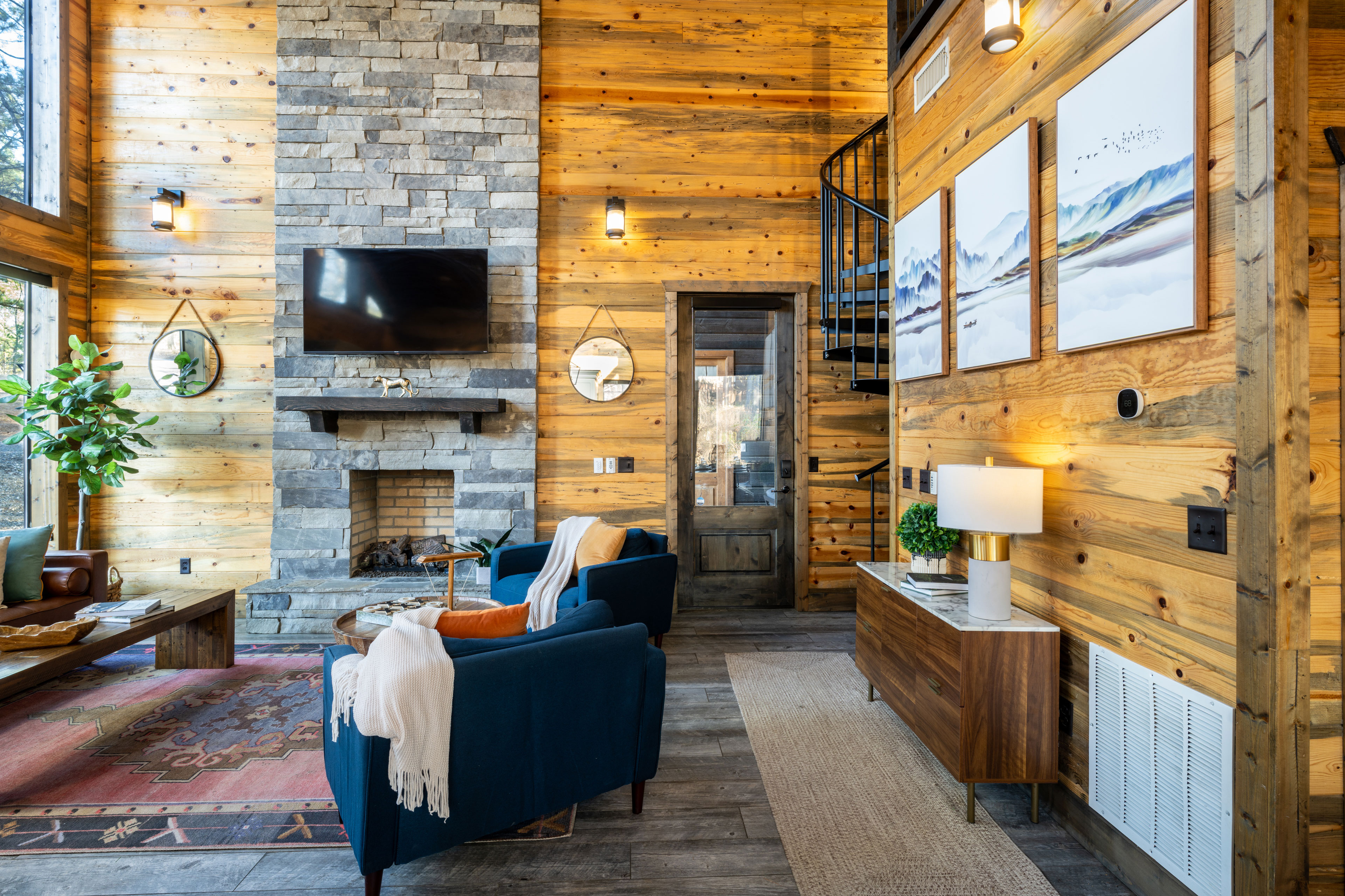 A welcoming entryway fitted with a stylish console stocked with games and flashlights. 