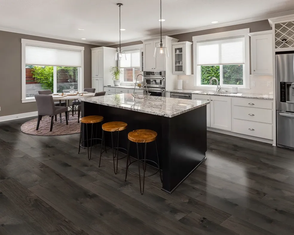 Kitchen Remodel with Dark Island and White Cabinetry