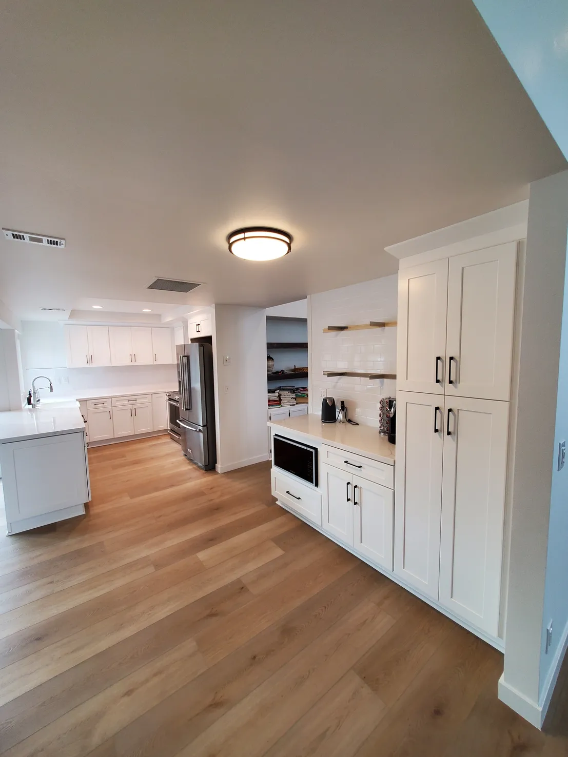 Large Kitchen Remodel With White Shaker Cabinets